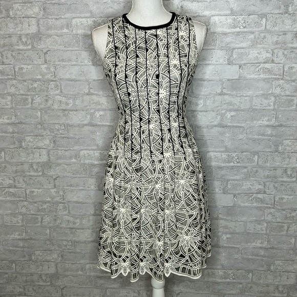 ANTONIO MELANI Dresses & Skirts - Antonio Melani black and cream overlay fit n flare dress size 2